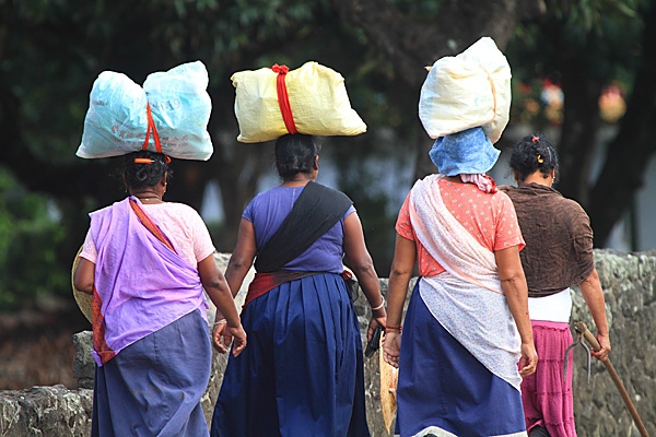 Mauritius,Women carying bags on their headS